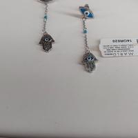 orecchini acciaio mano di fatima