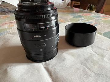 Obiettivo Sigma 28/70 f 3,5-4,5 con tappi e paralu