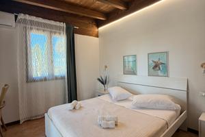 Monolocale con patio privato a 30m dal mare