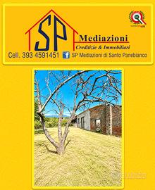 Terreno con fabbricato