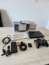 PlayStation 2 slim + accessori +joystick + 19 gioc