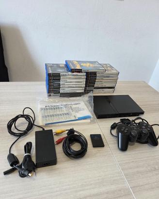 PlayStation 2 slim + accessori +joystick + 19 gioc