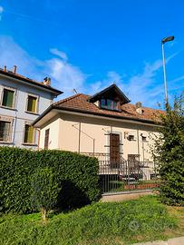Bilocale arredato  con giardinetto e box
