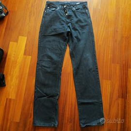 Gianni Versace jeans neri sul grigge 