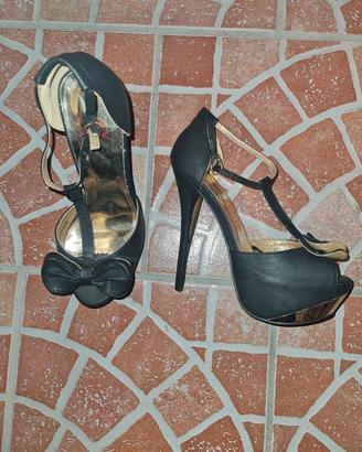 Sarpa tacco nera oro