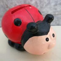 Salvadanaio coccinella in preziosa ceramica