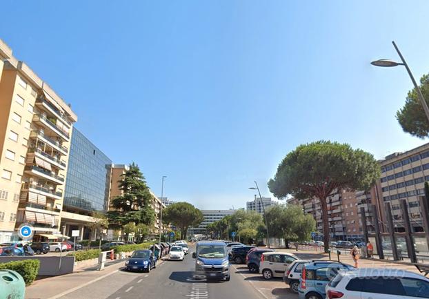 Cinecitta quadrilocale con terrazzo