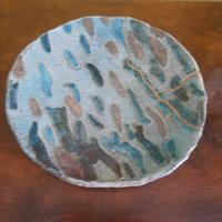 Piatto centro tavola in ceramica Raku