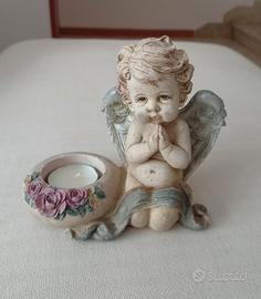 Angelo portacandela in ceramica 
