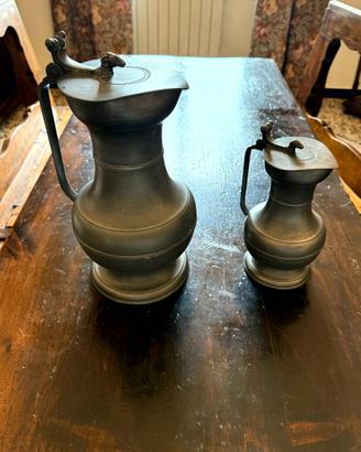Coppia brocche caraffe PELTRO testa di ariete