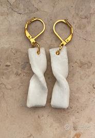 Orecchini fini ed eccentrici