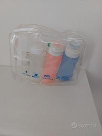 3 flaconi in silicone per viaggio con ventosa. 