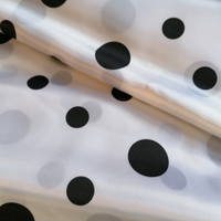Tessuto raso bianco a pois