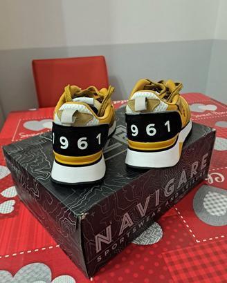 Scarpe uomo navigare