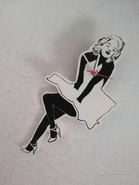 Orologio decorativo da parete con parti semoventi