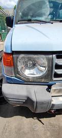 MITSUBISHI PAJERO 1998 FARO ANTERIORE SX/DX