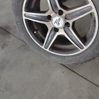 Cerchi in lega 14" e gomme invernali in buone cond