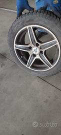 Cerchi in lega 14" e gomme invernali in buone cond