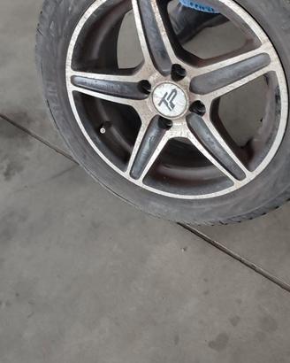 Cerchi in lega 14" e gomme invernali in buone cond