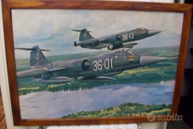 3 cornici in legno con riproduzioni di aerei