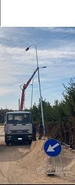 Eurocargo ribaltabile con gru