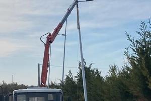 Eurocargo ribaltabile con gru