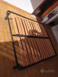 due materassi singoli più rete con doghe legno 