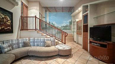 Divano angolare con pouf coordinato