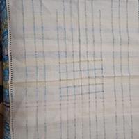 Centrotavola in lino ricamato a mano