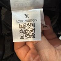 Parka con motivo monogram e cappuccio.