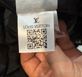 Parka con motivo monogram e cappuccio.