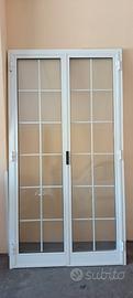 porta doppia  di anticorodal con vetro  e telaio