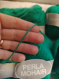quattro gomitoli di lana mohair verde