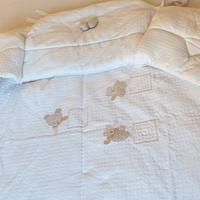 set paracolpi + sacco con piumino per lettino 