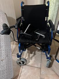 Sedia a rotelle elettrica