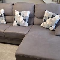 Divano con penisola letto