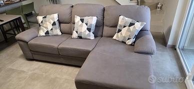 Divano con penisola letto