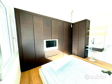 Armadio angolare con TV Samsung + zona trucco