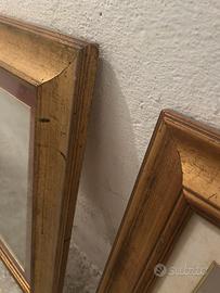 Cornice in legno dorata e anticata