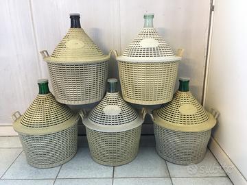 5 damigiane da 20 litri con 2 travasatori