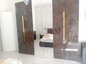 Camera da letto completa letto a cassettone