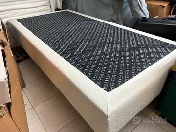 Letto in legno foderato pelle singolo