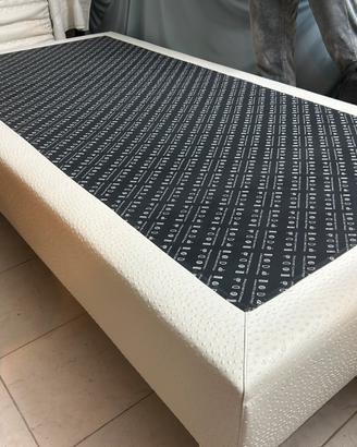 Letto in legno foderato pelle singolo