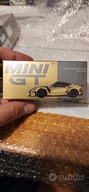 MiniGT Nissan Z VeilSide FFZ400 Gold Chrome 1:64 