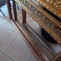 Cornici di legno dorate