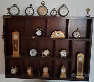 Collezione Excelsior 17 orologi in bacheca legno