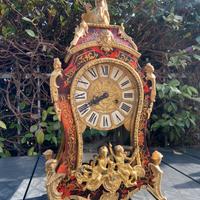 Orologio antico da tavolo in legno con pendolo