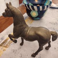scultura ottone