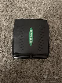 Pedana regolabile per allenamento alle gambe.