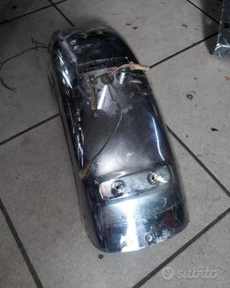 CB Four 350 F 72-74: parafango faro spie